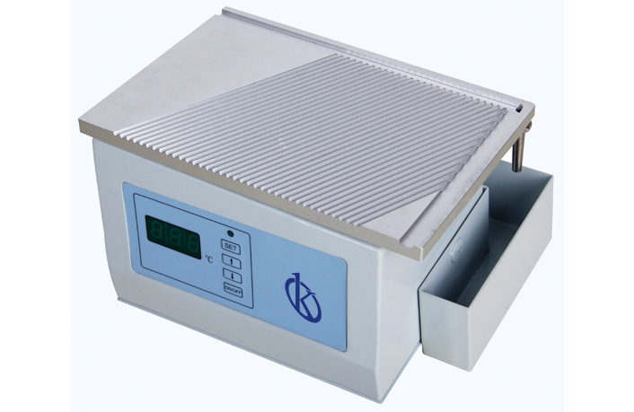 How does the Paraffin Trimmer or Dispenser work in the Lab?